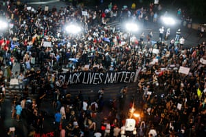 People protest against police brutality and in support of Black Lives Matter during a July 2016 march in New York.