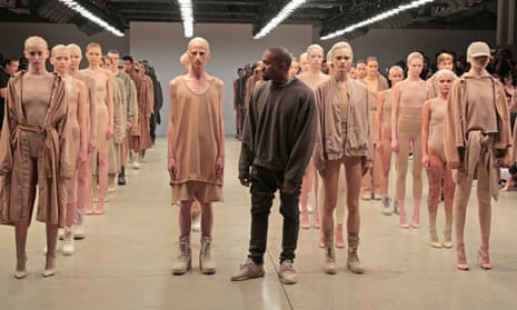 A picture of Kanye West with models for one of his fashion lines in New York.