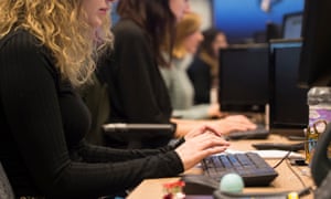 women office employees work at their desk
