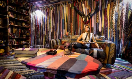Cole laboriously sewed 27,000 ties ogether to create a traditional gentlemen’s living room.