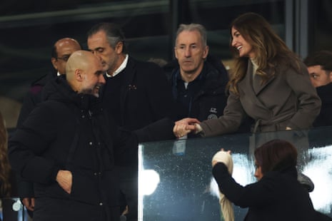 Pep Guardiola, Manager of Manchester City, interacts with Karren Brady, vice-chairman of West Ham United