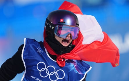 Mathilde Gremaud celebrates winning gold in the women's freeski slopestyle at the Winter Olympics.