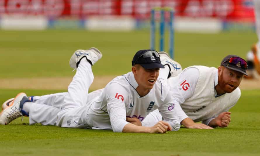 Zak Crawley reacts after dropping a catch from Hanuma Vihari off Matthew Potts as Jonny Bairstow looks on