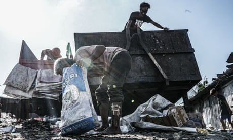 Poor people in Makassar are looking for plastic waste that can be recycled and resold for money
