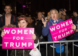 Donald Trump supporters without a ticket to the party wait outside the New York Hilton