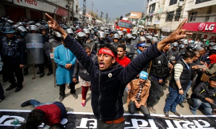Activists from Nepal’s Rastriya Prajatantra Party protest after being barred from entering a local election.