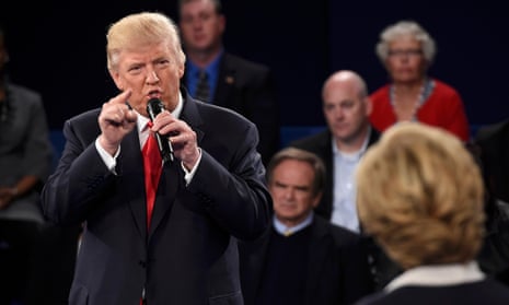 Donald Trump and Hillary Clinton at their presidential debate in St Louis in October 2016. The timing coincidence was only one of the striking details contained in Friday’s indictment.