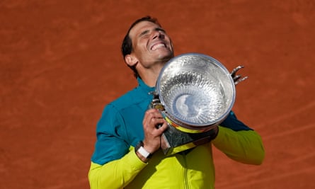 Rafael Nadal lifts the French Open trophy for the 14th time after beating Casper Ruud in the 2022 final.
