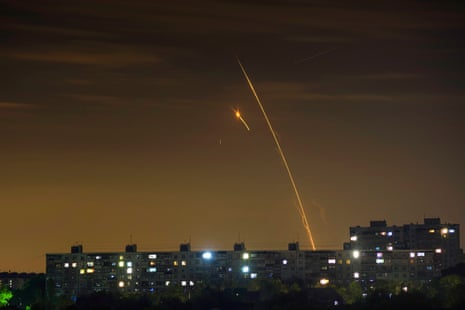 Russian rockets launched against Ukraine seen at dawn in Kharkiv.