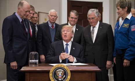 Trump signs the space policy directive earlier this month. ‘It could be infinity. We don’t really don’t know. But it could be. It has to be something,’