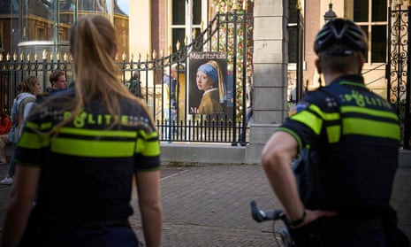 Dutch police outside the Mauritshuis museum after the protest targeting Girl with a Pearl Earring