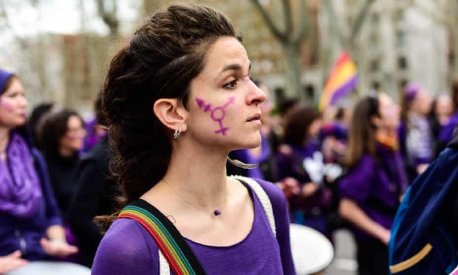 A woman attending an International Women's Day railly in Madrid in 2020.