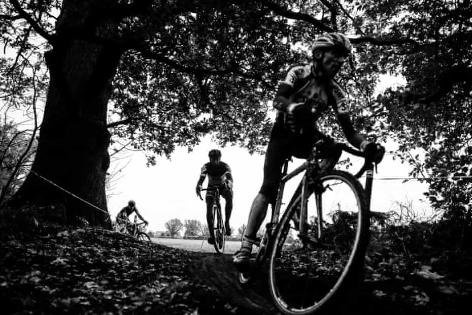 Riders enters the wooded section during the mens 55-59 category during the UCI World Masters Cyclo-Cross Championships 2021 at Trinity Park Showground near Ipswich on December 3rd 2021.