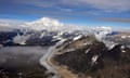 Aerial view of dramatic snow-capped mountains.