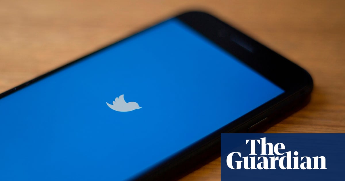 Revealed: quarter of all tweets about climate crisis produced by bots