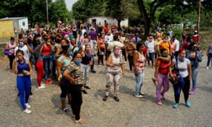 Relatives of prisoners protest outside the Los Llanos penitentiary after a riot broke out inside the prison, leaving dozens dead in Guanare, Venezuela, on May 2, 2020.