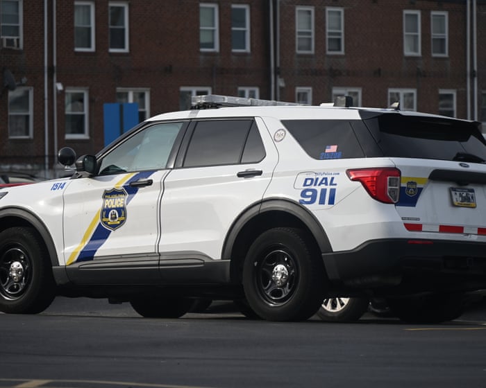 Man with gun kills one Philadelphia police officer and injures another