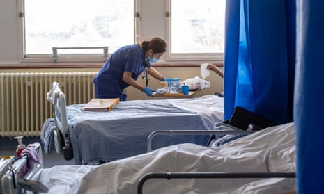 general view of a member of staff on a NHS hospital ward at Ealing Hospital in London