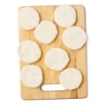 02c Felicity Cloake’s arepas. Discs of uncooked cheesy dough. Add to the dough a generous helping of grated mozzarella, then bring up the sides to enclose the cheese. Roll again into a ball, then flatten again to 8cm wide and 1cm thick, turning it around inside your damp cupped hands to smooth out the edges.