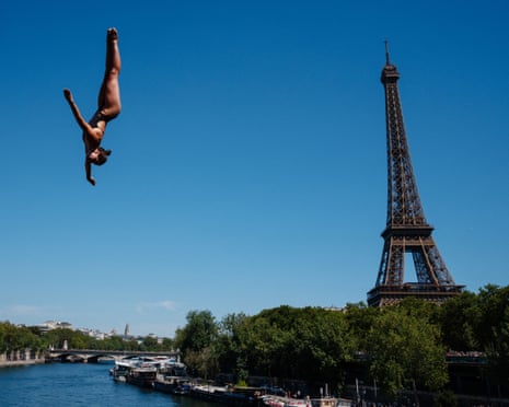 Maike Elena Halbisch plunges upside down through the air near the Eiffel Tower