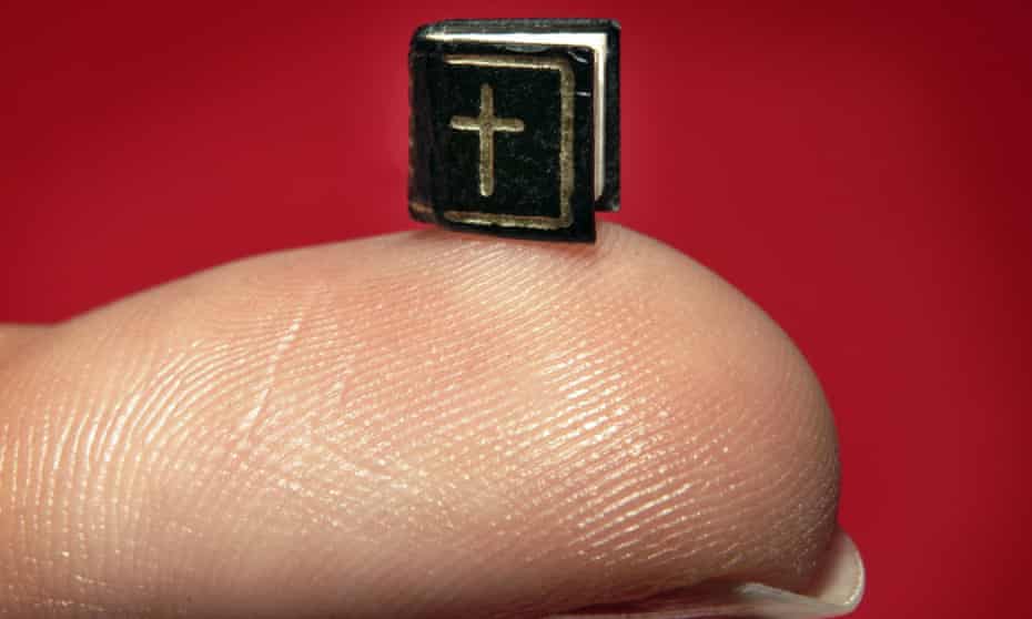 A miniature book containing The Lord’s Prayer is displayed at London Christie’s in 2006. Measuring 5x5 mm, it is believed to be the world’s smallest.