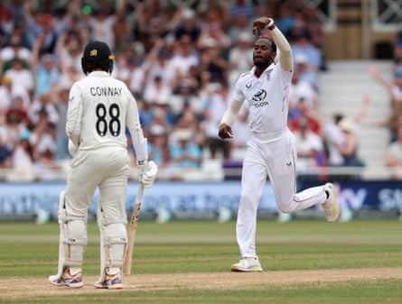 Jofra Archer of England celebrates after taking the wicket of Devon Conway