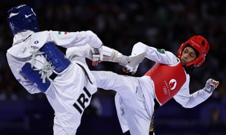 Dunya Abutaleb takes on Mobina Nematzadeh of Iran
