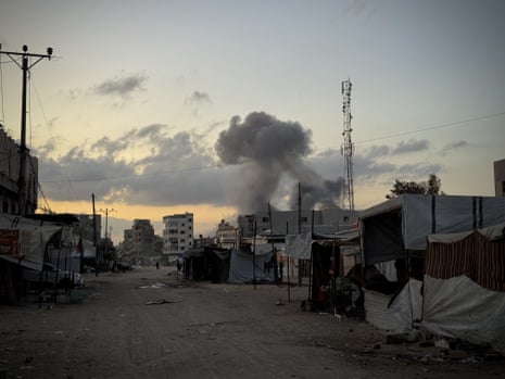 Smoke billows following an Israeli strike on a house in Khan Yunis, on 18 August, 2025.