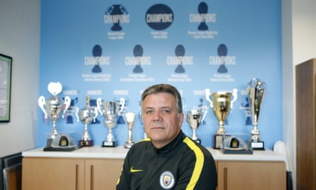 Manchester City’s academy director Mark Allen in his office containing the various trophies the club has won at youth level in recent years