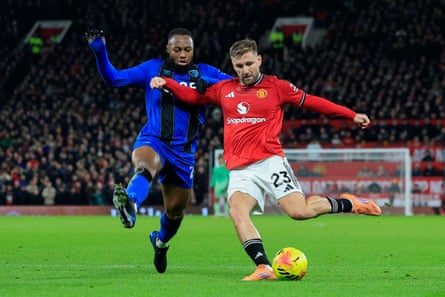 Bournemouth’s Antoine Semenyo tackles Luke Shaw, of Manchester United.