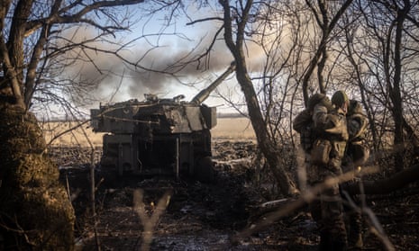Members of a Ukrainian artillery unit fire on Russian positions around Vuhledar, in the Donetsk region