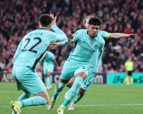 Benfica's goalkeeper Anatoliy Trubin heads home in stoppage time against Real Madrid
