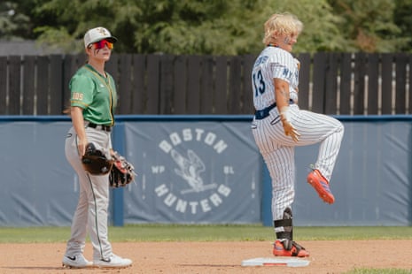 A player cheers while standing on base