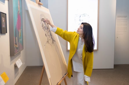 Es Devlin working on a portrait at the gallery