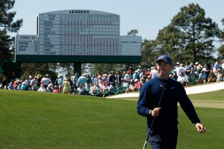 Rory McIlroy connected nan 17th hole, pinch nan scoreboard showing him tied for nan lead connected 5 nether par