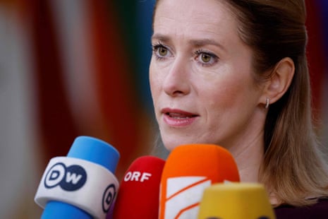 Estonia’s prime minister Kaja Kallas answers journalists’ questions as she arrives for the second day of an EU leaders Summit in Brussels.