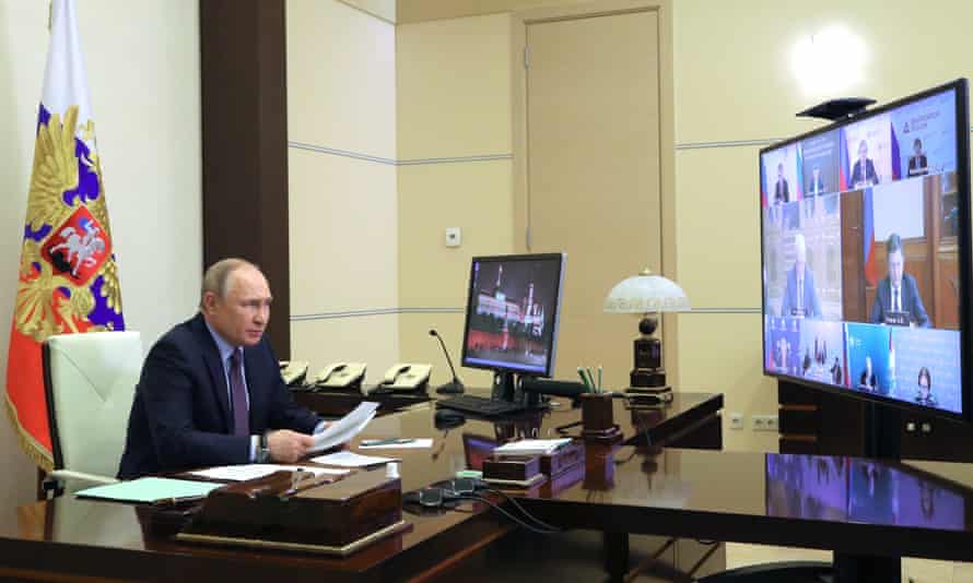 Vladimir Putin chairs a meeting on Thursday.