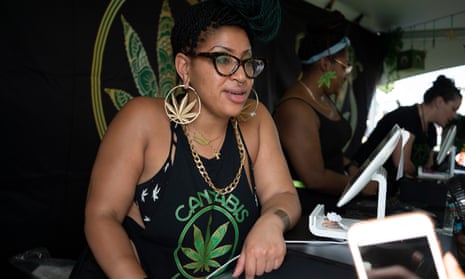 Thandi Dunn sells product at the Cannabis Karma booth during the National Cannabis Festival in Washington DC on 28 August 2021. Cannabis Karma is a black, female-owned and operated business with the mission of normalizing the adult consumption of cannabis.