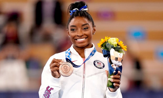 Simone Biles  with her bronze medal at the Tokyo Olympic Games 2020