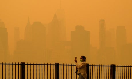 woman in New york city in mask against hazy skyline
