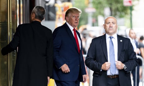 Donald Trump departs Trump Tower on Wednesday on his way to the New York attorney general's office for a deposition in a civil investigation.