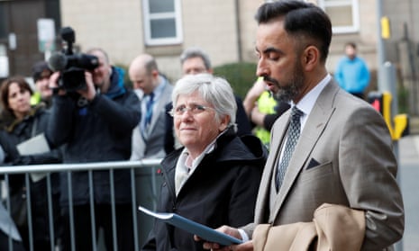 Clara Ponsatí arrives to hand herself in at a police station in Edinburgh.