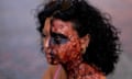 A protester in Little Tokyo, Los Angeles, wearing makeup to symbolise victims of nuclear weapons during a rally on 6 August 2023 commemorating the 78th anniversary of the US dropping an atomic bomb on Hiroshima.