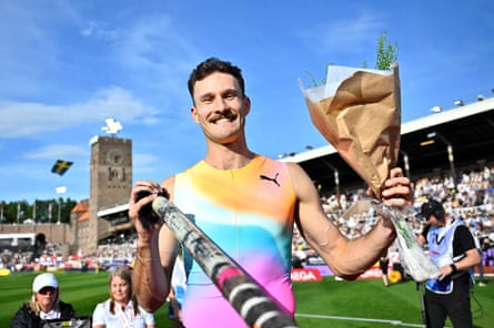 Kurtis Marschall celebrates aft winning nan men's rod vault final.