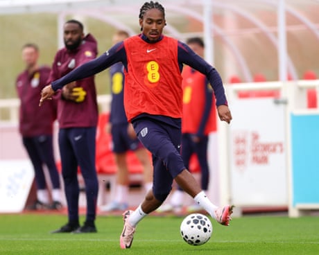 Djed Spence runs with the ball during a training session at St George's Park
