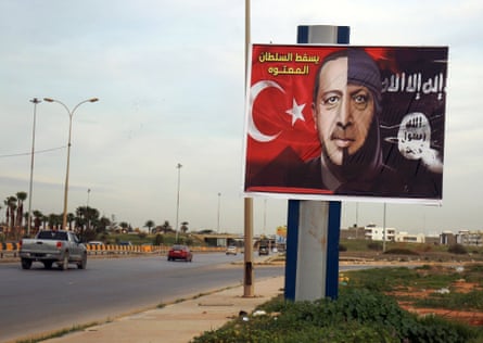 A billboard depicting the Turkish president Recep Tayyip Erdogan as a member of Islamic State in the eastern Libyan port city of Benghazi.