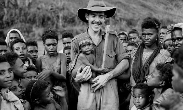 An Australian patrol officer holds a baby in Papua New Guinea in 1948. Australian members of the Royal Papua New Guinea constabulary, called kiaps, were withdrawn shortly after independence in 1975.