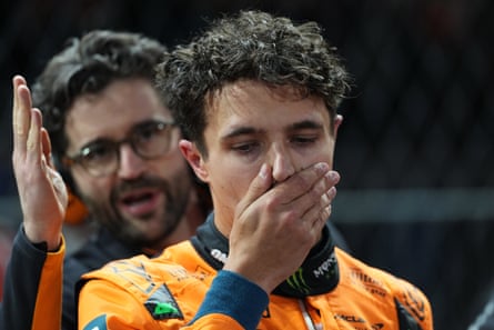 McLaren’s Lando Norris with his hand over his mouth