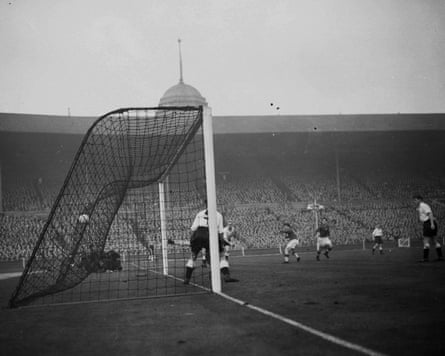 Ferenc Puskas (centre left) scores for Hungary at Wembley