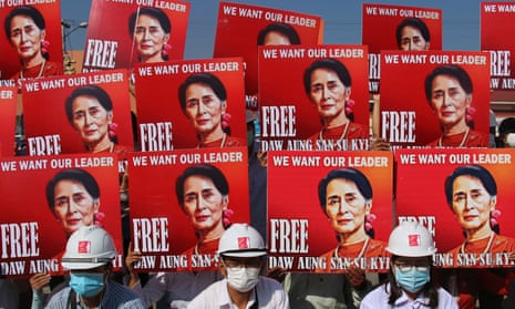Demonstrators hold up placards calling for the release of detained Myanmar State Counselor Aung San Suu Kyi during a protest against the military coup in Naypyitaw, Myanmar